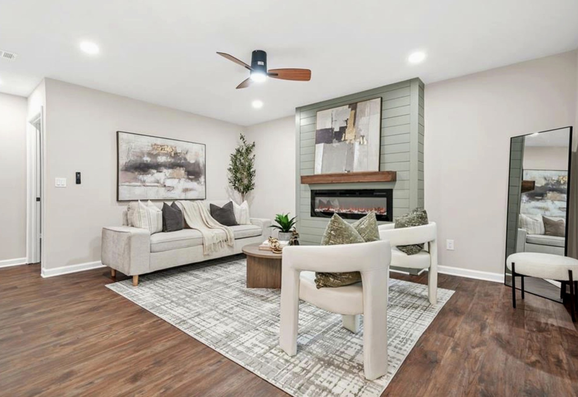 The same living room after professional staging by The House Stylists